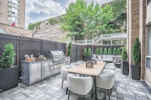 This city condominium balcony, designed by Red Barrinuevo, uses every inch of available space but still feels open and airy.